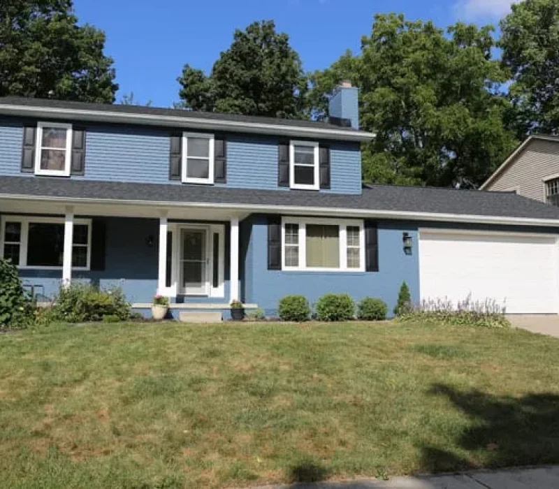Freshly-painted-aluminum-siding-and-brick-house