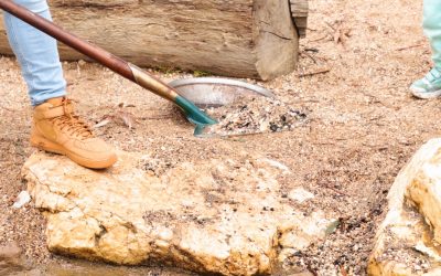 close-up-person-using-shovel-pan-gold