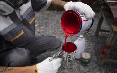 high-angle-man-pouring-paint