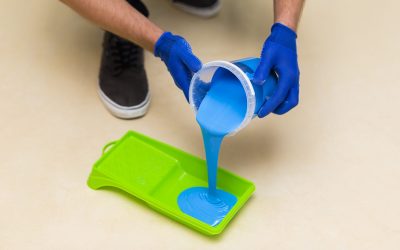 high-angle-man-putting-paint